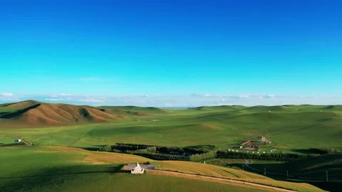 Aerial View of Rolling Green Grasslands and Scenic Landscape in Inner Mongolia 스톡 동영상 342217341