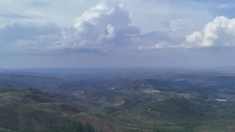 Aerial View of Rolling Hills and Forest Landscape Stock Footage 325593454