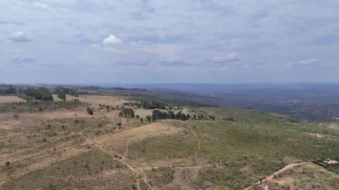 Aerial View of Rolling Hills and Forest Landscape 스톡 동영상 325593597