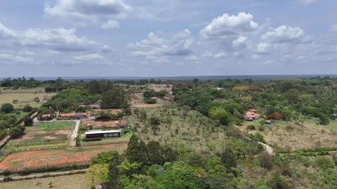 Aerial View of Rolling Hills and Forest Landscape Stock Footage 325593653