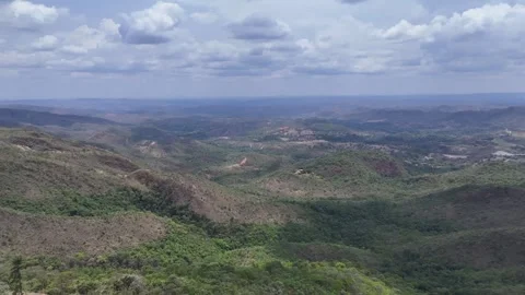 Aerial View of Rolling Hills and Forest Landscape Stock Footage 325593670