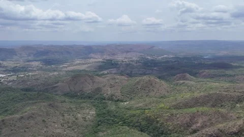 Aerial View of Rolling Hills and Forest Landscape Stock Footage 325593692