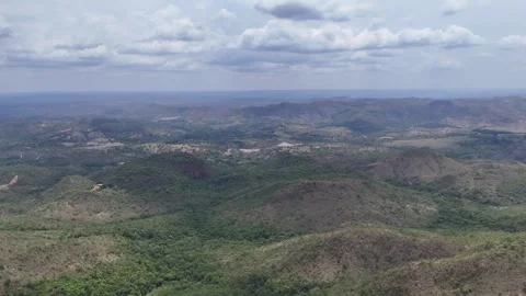 Aerial View of Rolling Hills and Forest Landscape Stock Footage 325593694