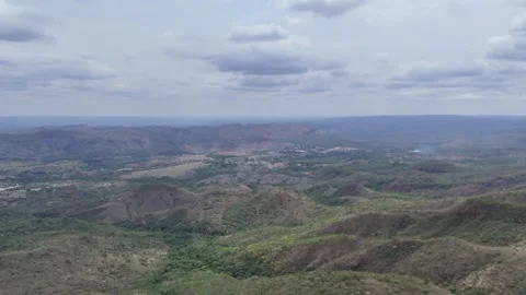 Aerial View of Rolling Hills and Forest Landscape Stock Footage 325607632