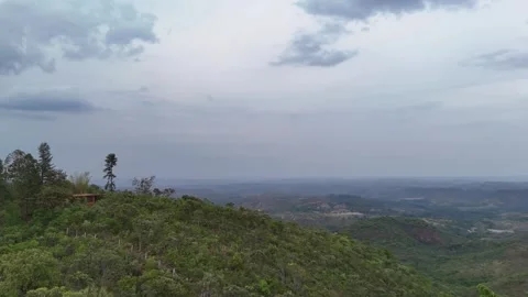Aerial View of Rolling Hills and Forest Landscape Stock Footage 325607745