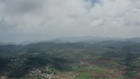 Aerial View of Rolling Hills and Agricultural Fields, Gandhi Pettai, Ooty Vídeos de archivo 332949044