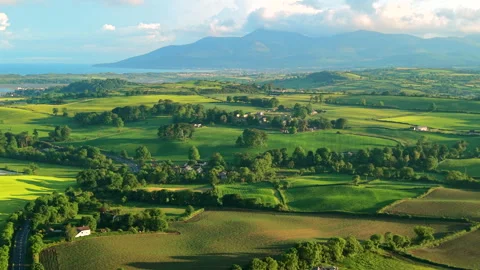Aerial view of rolling hills and Mourne Mountains during sunset county Down.. Stock Footage 337321434