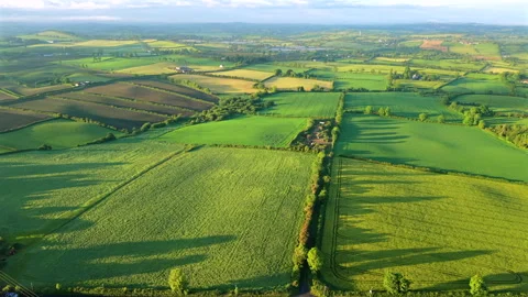 Aerial view of rolling hills and Mourne Mountains during sunset county Down.. Stock Footage 337321741