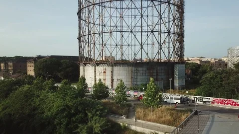 Aerial view, Rome at sunset, pan view of the Gasometer in an old district Stock Footage 90644609