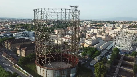 Aerial view, Rome at sunset, River, bridges and the Gasometer in an old district Stock Footage 90644645