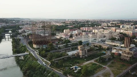 Aerial view, Rome at sunset, River, bridges and the Gasometer in an old district Stock Footage 90645321