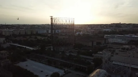 Aerial view, Rome at sunset, River, bridges and the Gasometer in an old district Stock Footage 90645331