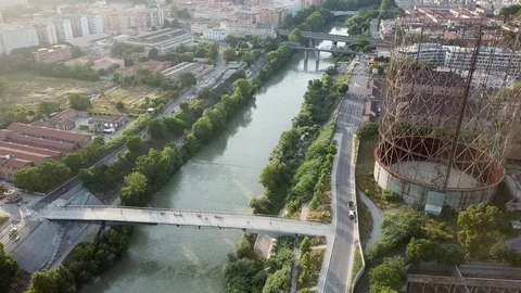 Aerial view, Rome at sunset, River, bridges and the Gasometer in an old district Stock Footage 90658251