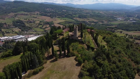 Aerial view of Romena Castle surrounded by forest Stock Footage 324620262
