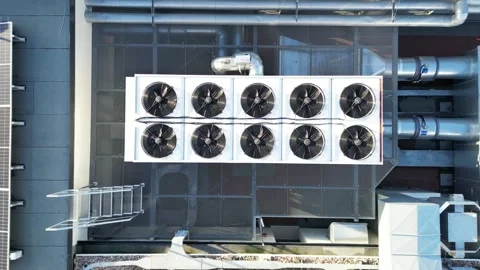 Aerial view of rooftop cooling units with modern ventilation systems Stock-Footage 321397316