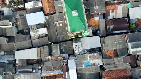 Aerial view rooftop of crowded slum neighborhood Jakarta Stock Footage 147616754