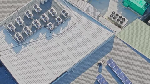 Aerial view of rooftop hvac units and solar panels Stock Footage 340570862