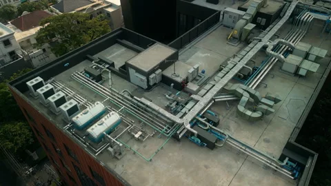 Aerial View of Rooftop Mechanical and HVAC Systems on Office Building Stock Footage 314031101