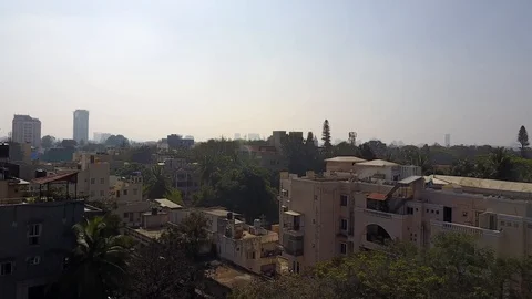 Aerial view of rooftops and cityscape Bangalore India 4K Stockbeeldmateriaal 90356622