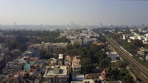 Aerial view of Rooftops and train tracks in Bangalore city in India 4K Stockbeeldmateriaal 90356636