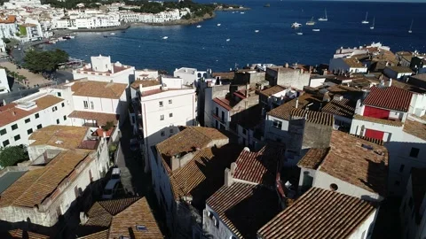 Aerial view of the rooftops of Cadaques Stock Footage 136908401