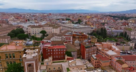 Aerial view rooftops of the city of Rome, Italy. Establishing shot of the Stock Footage 306366835