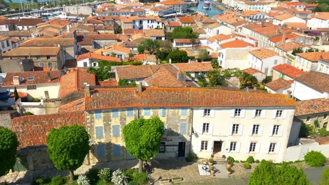 Aerial view of the rooftops of the city of Saint-Martin-de-Ré from the church Stock Footage 243367464