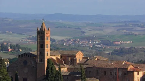 Aerial view of the rooftops of medieval Siena and beautiful hills Stock Footage 127468796