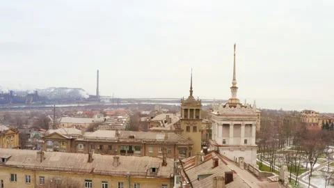 Aerial view of the rooftops of a winter city Stock Footage 100870333