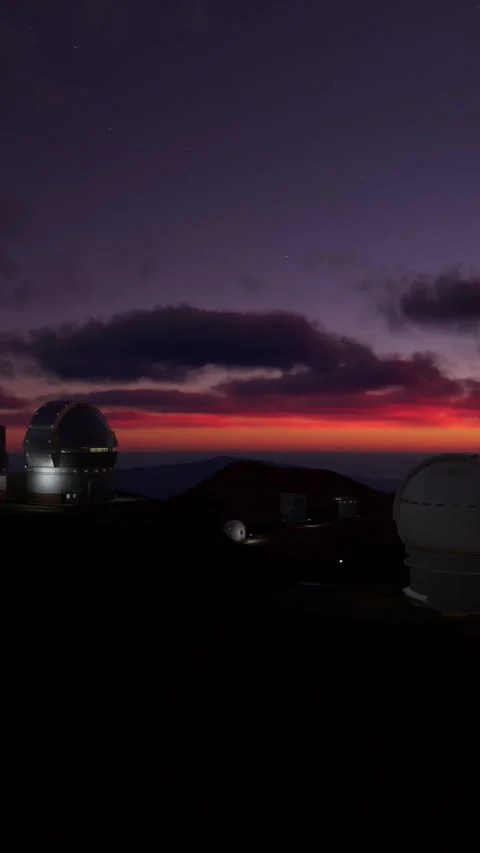 Aerial view rotating circularly at sunset of the Mauna Kea observatory in Hawaii Stock Footage 283405575
