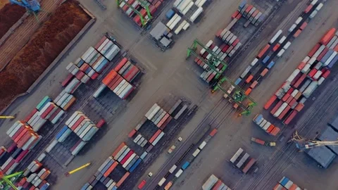 Aerial view from a rotating drone of the cargo area of the port with containers 스톡 동영상 149370720