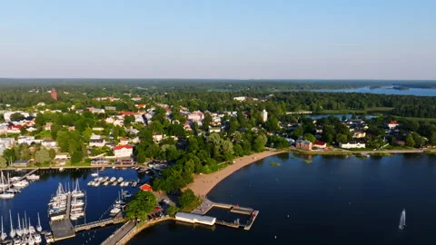 Aerial view rotating over the beach toward old town of Tammisaari, Finland Video stock 335182863