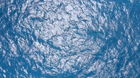 Aerial view of rough blue sea with waves directly from above Stock Footage 160565751