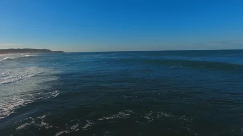 Aerial view of Rough sea waves splash with blue sky Stock Footage 124535172