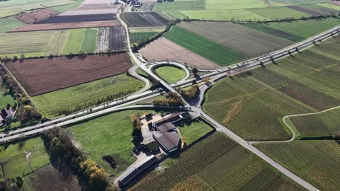 Aerial view of the roundabout and fields, France. Stock Footage 320531451