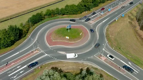 Aerial view of a roundabout. 스톡 동영상 275037757