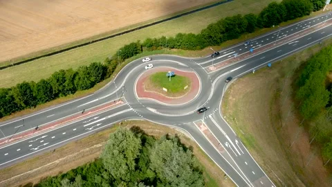 Aerial view of a roundabout. 스톡 동영상 275279202