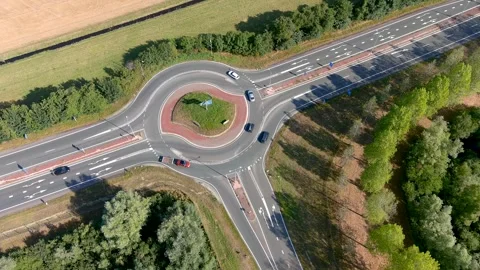 Aerial view of a roundabout. 스톡 동영상 275294630