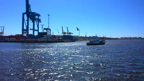 Aerial view of a row of construction or cargo cranes on the river bank 스톡 동영상 136151348