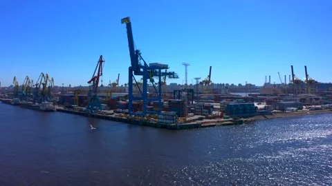 Aerial view of a row of construction or cargo cranes on the river bank 스톡 동영상 136152304