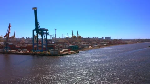 Aerial view of a row of construction or cargo cranes on the river bank 스톡 동영상 136152440