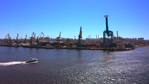 Aerial view of a row of construction or cargo cranes on the river bank 스톡 동영상 136153302