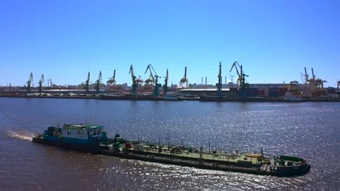 Aerial view of a row of construction or cargo cranes on the river bank Video stock 136154561