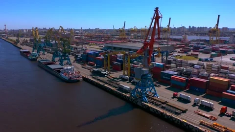 Aerial view of a row of construction or cargo cranes on the river bank 스톡 동영상 136154808