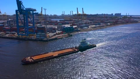 Aerial view of a row of construction or cargo cranes on the river bank Video stock 136157151