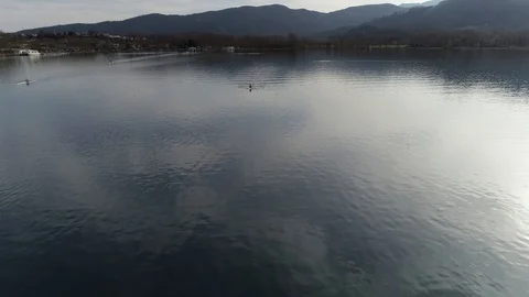 Aerial view of rowing boat training on a pond Stock Footage 106400402