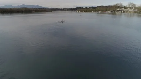 Aerial view of rowing boat training on a pond Stock Footage 106400532