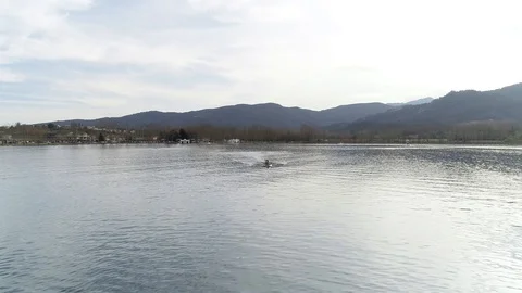 Aerial view of rowing boat training on a pond Stock Footage 106400566