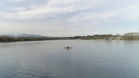 Aerial view of rowing boat training on a pond Stock Footage 106400596