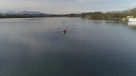 Aerial view of rowing boat training on a pond Stock Footage 106400620